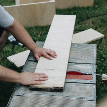 cutting burnt wood on a table saw without safety equipment