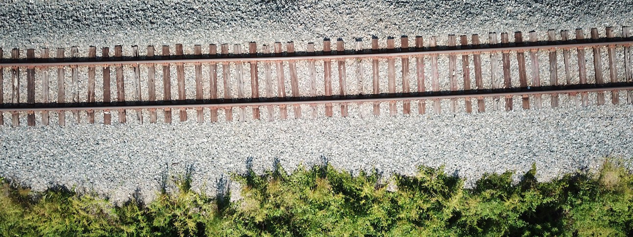 train tracks on gravel