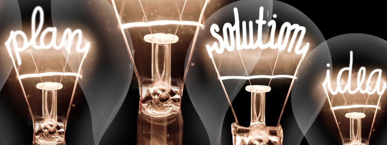 Light bulbs with the text Plan Solution Idea