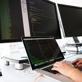 Developer with open editor in terminal